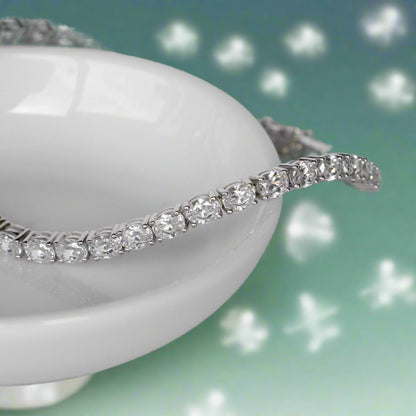 14K WHITE GOLD OVAL TENNIS BRACELET